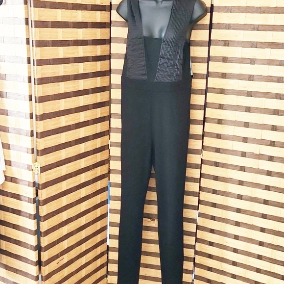 NWT!! Bebe catsuit zip back open back - Picture 1 of 12